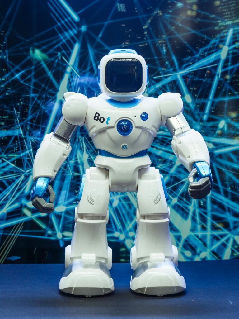 Futuristic humanoid robot against a blue network pattern backdrop, showcasing modern technology.